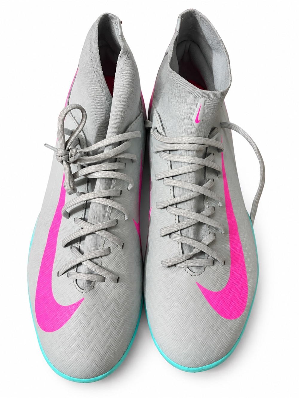 Nike Women's Light Gray Indoor Soccer Cleats with Pink Swoosh and Teal Trim
